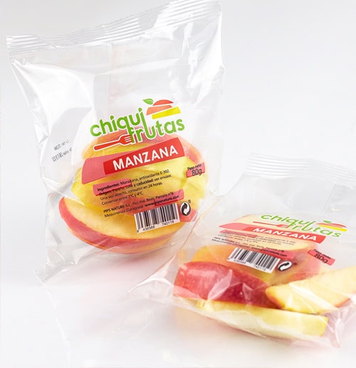 Manzana cortada en bolsas individuales